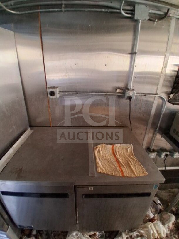 2020 Diamond Cargo 24' Custom Mobile Kitchen interior with stainless steel, Arctic Air Refrigeration, and Pyro-Chem system.