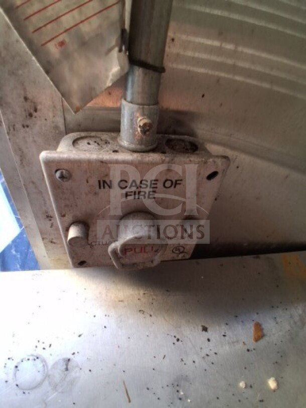 2020 Diamond Cargo mobile kitchen fire suppression system control labeled "In Case of Fire."