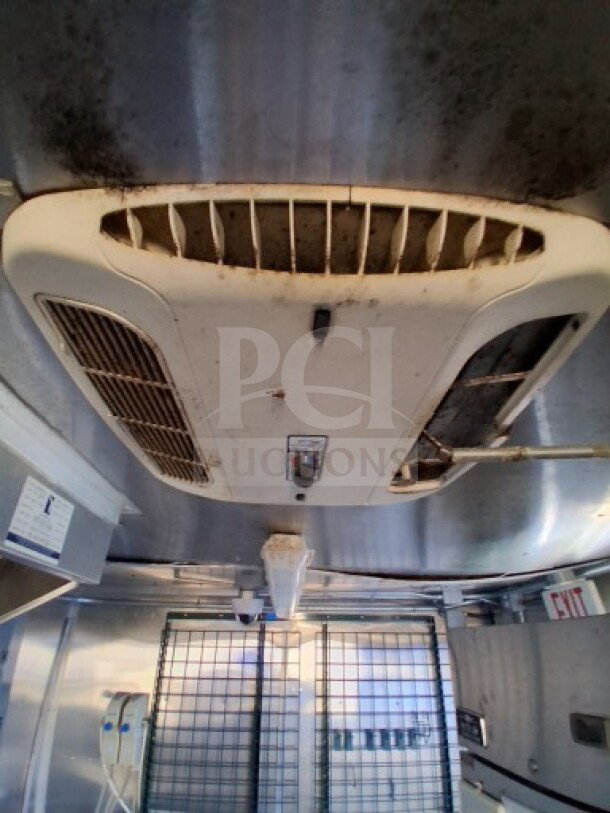 2020 Diamond Cargo 24' Custom Mobile Kitchen interior, showcasing stainless steel finish and ventilation system.