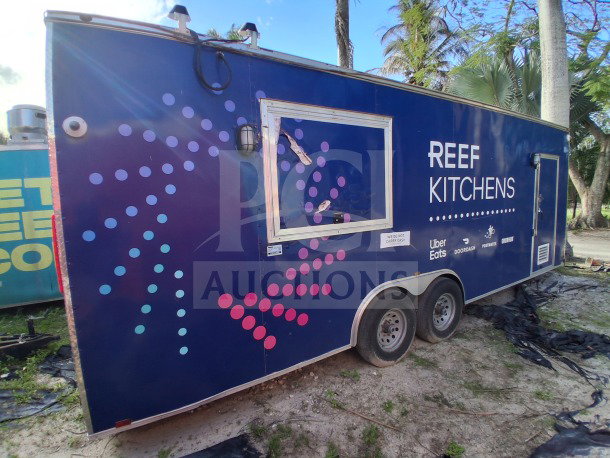 2019 D&A Custom 24FT Mobile Kitchen, dark blue wrap, "REEF KITCHENS" signage, dual axles, excellent condition.