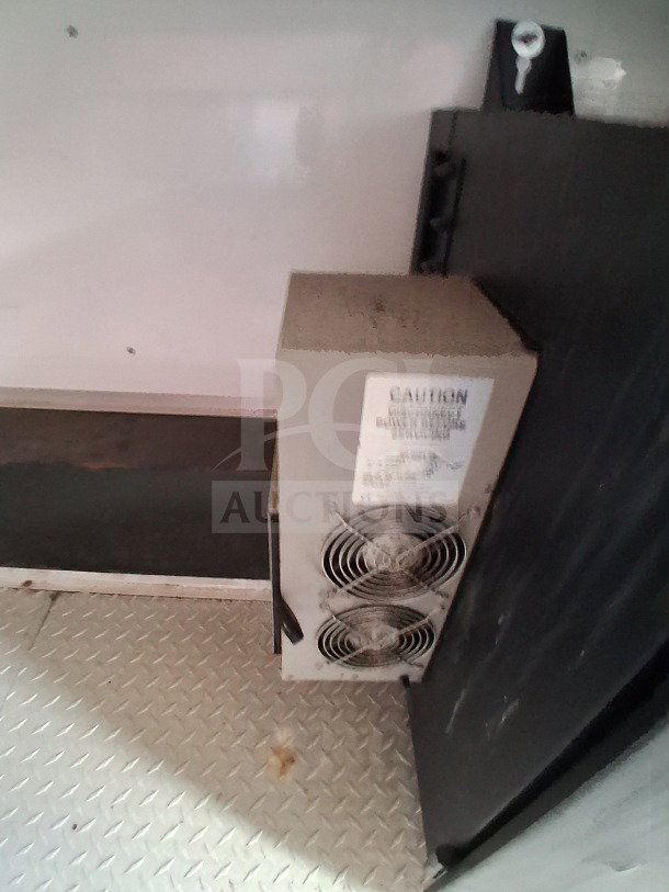 Interior view of 2019 D&A Custom Mobile Kitchen with air curtain unit. Diamond plate flooring, good condition.
