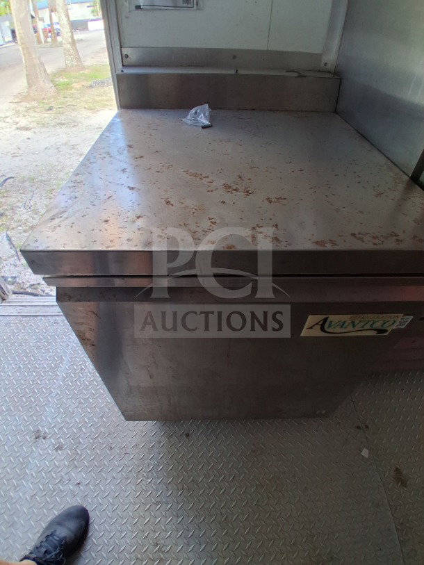 2019 D&A Custom Mobile Kitchen; stainless steel prep table with Avantco refrigeration. Shows slight surface wear.