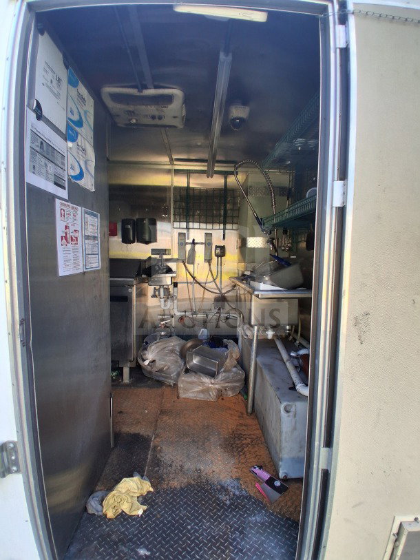 2019 Diamond Cargo 24' mobile kitchen interior with Frymaster, Arctic Air equipment. Requires deep cleaning for optimal use.