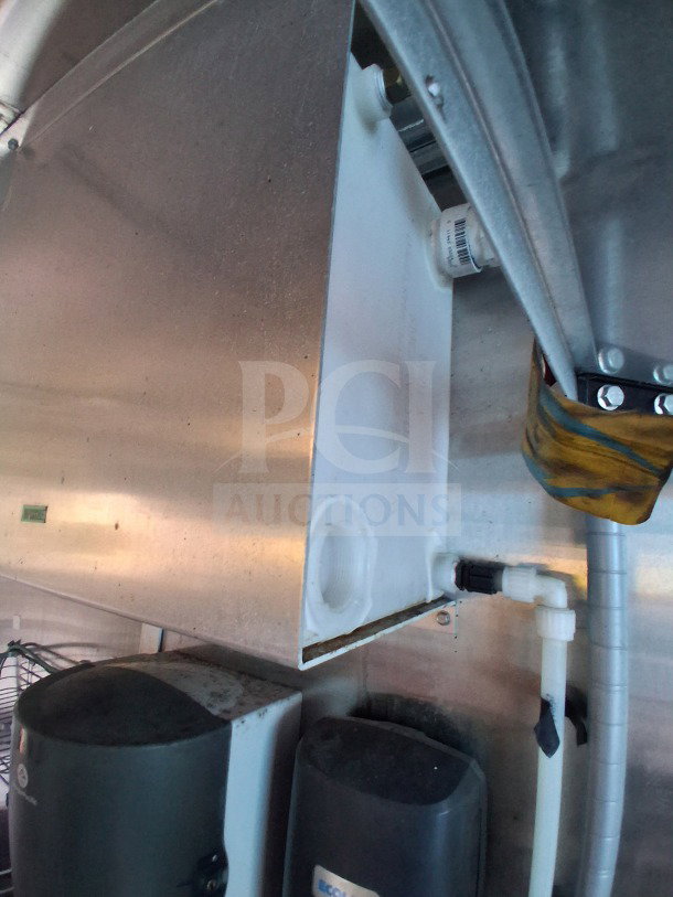 Interior of a 2019 Diamond Cargo 24' mobile kitchen featuring ventilation and equipment. Requires deep cleaning.