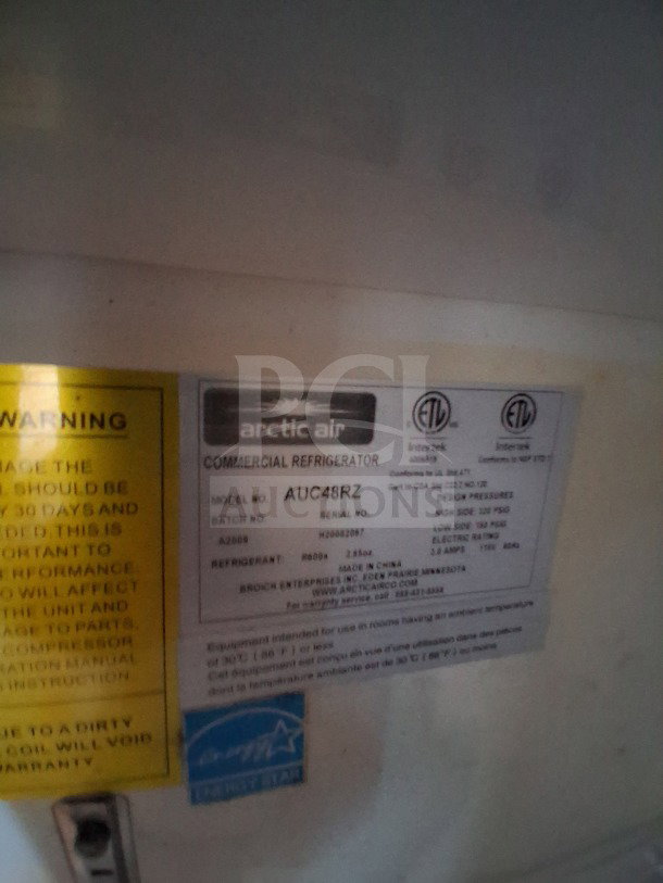 Arctic Air commercial refrigerator label showing Model AUC48RZ, batch A2009, Serial H2008207, made in China.
