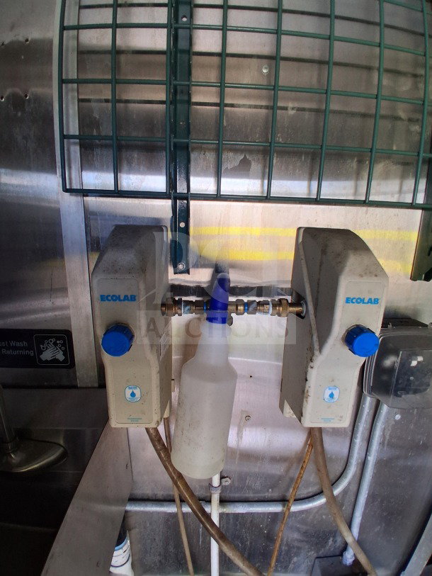 Ecolab cleaning system with spray bottle in 2019 Diamond Cargo mobile kitchen, requiring interior deep clean.