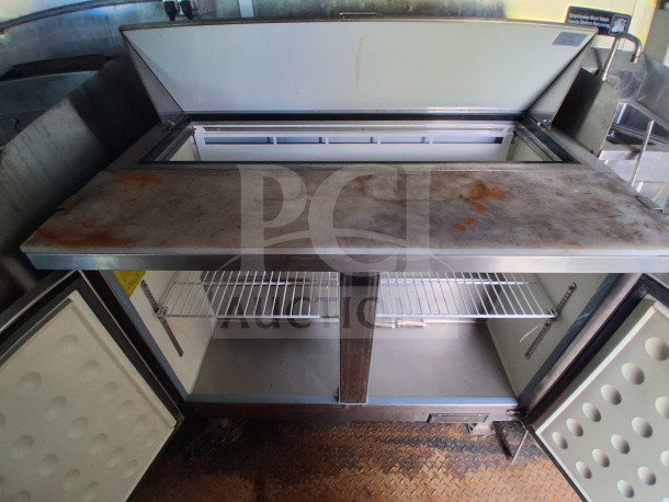 2019 Diamond Cargo mobile kitchen with ventilation and heavy-duty Frymaster, Arctic Air equipment; interior needs deep clean.