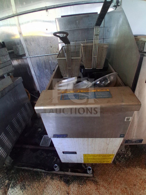 2019 Diamond Cargo 24' mobile kitchen interior with Frymaster equipment. Needs deep cleaning. VIN visible.