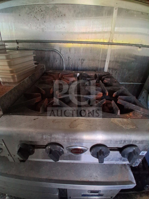 2019 Diamond Cargo 24' mobile kitchen with Wells stovetop. Requires cleaning. Includes Frymaster and Arctic Air equipment.