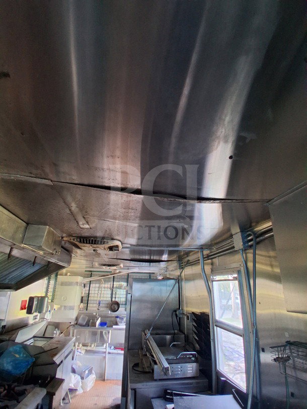2019 Diamond Cargo 24' mobile kitchen interior, equipped with Frymaster and Arctic Air. Requires deep cleaning.