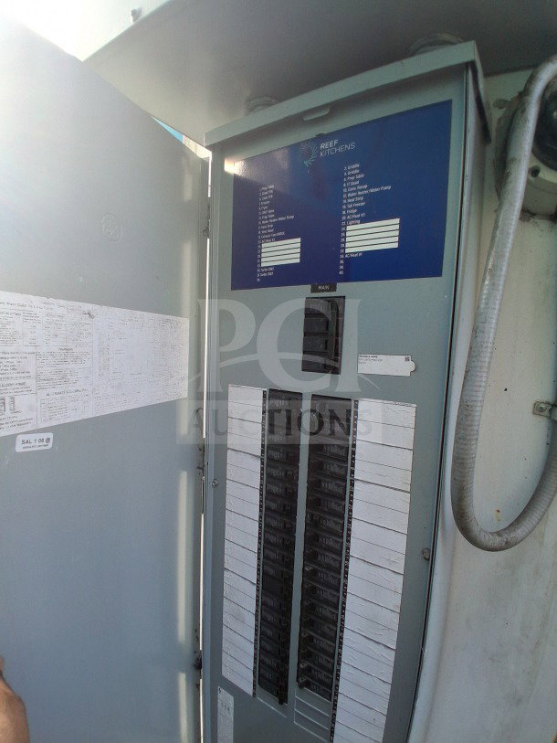 Electrical panel inside a 2019 Diamond Cargo 24' mobile kitchen trailer, model "Kitchen on Wheels" by Reef Kitchens.