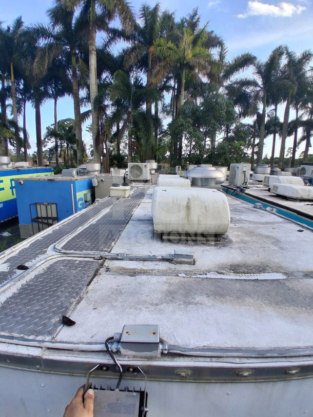 2019 Diamond Cargo 24' mobile kitchen roof view with ventilation system; requires deep clean for professional use.