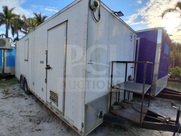 2019 Diamond Cargo 24' mobile kitchen trailer, white exterior, equipped with plumbing, ventilation, and gas lines; requires deep cleaning.