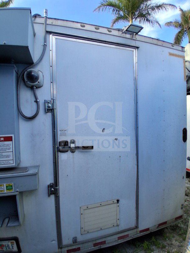 2019 Diamond Cargo 24' mobile kitchen trailer, white exterior, needs deep clean. Equipped with ventilation, fire suppression, and plumbing.