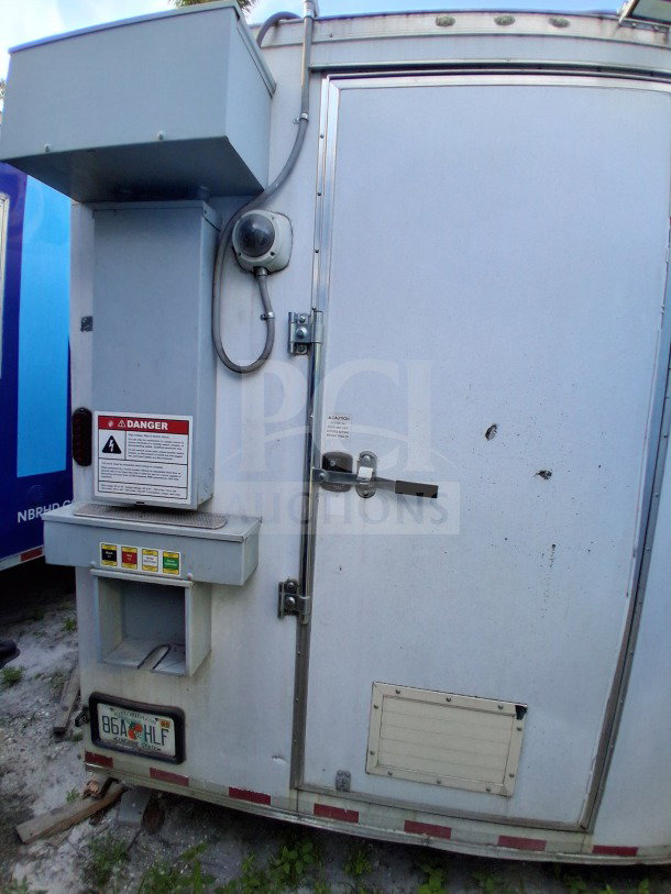 2019 Diamond Cargo 24' mobile kitchen, exterior view, with ventilation and alarm system installed. Needs deep clean.