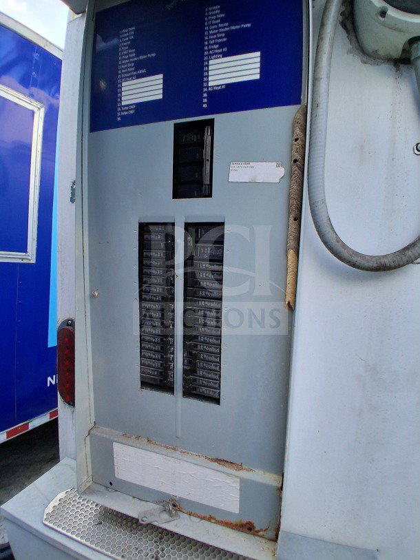 2019 Diamond Cargo 24' mobile kitchen electrical panel with detailed circuit labels. Needs deep clean. VIN: 53NBE2422m1090404.
