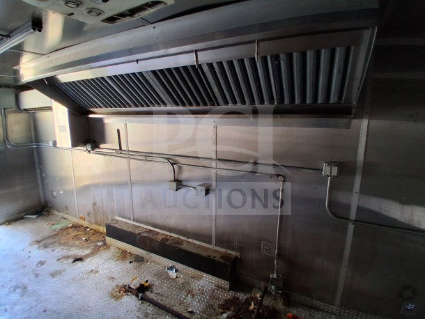 2019 Diamond Cargo 24' mobile kitchen interior, showing ventilation, plumbing, and electrical setup. Needs deep cleaning.