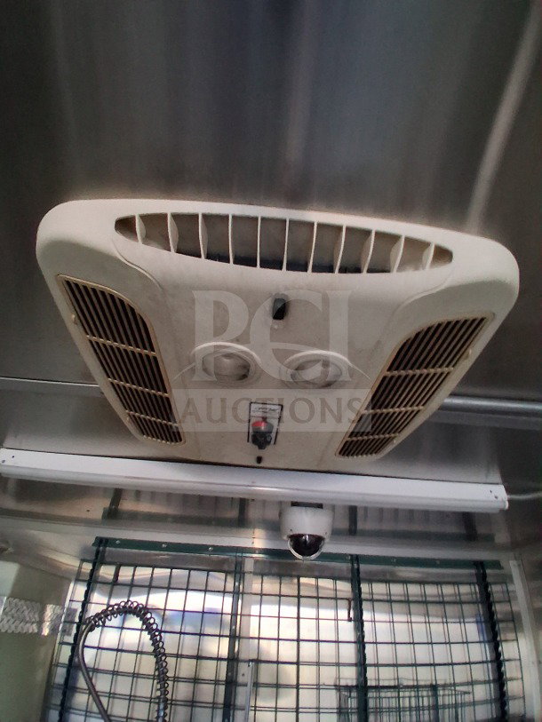 2019 Diamond Cargo mobile kitchen interior view, showing ventilation system, camera, plumbing fixtures; needs deep cleaning.