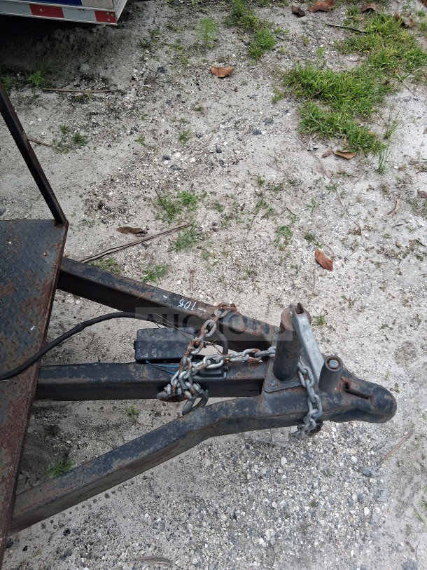 2019 Diamond Cargo 24' mobile kitchen trailer hitch with chains, on gravel; requires deep clean. Model: Kitchen on Wheels.