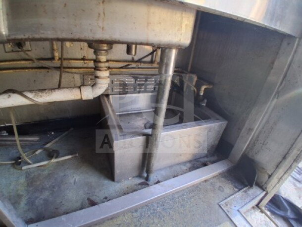 2019 Quality Cargo Food Trailer kitchen interior; visible plumbing and stainless steel sink.