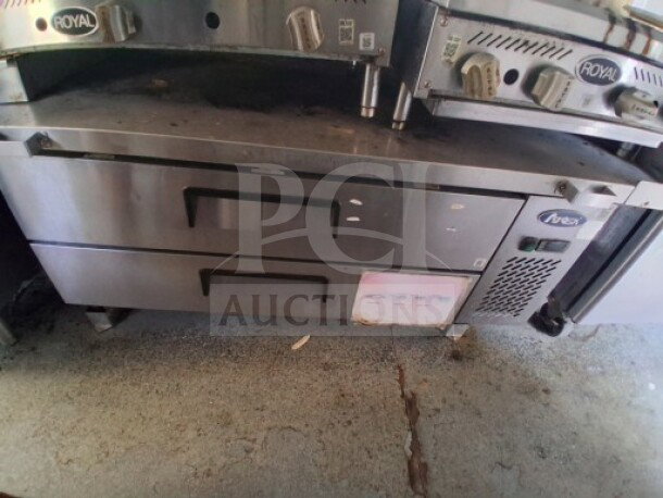 2019 Quality Cargo Food Trailer with stainless appliances; features grease hood, griddle, burner cooktop, dual fryers.