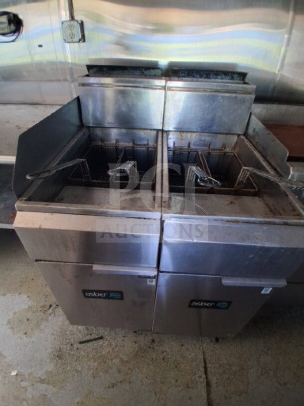 2019 Quality Cargo food trailer dual fryers, stainless steel, grease hood, used condition, commercial kitchen equipment.