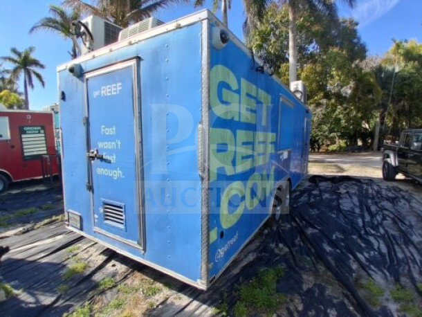 2019 Quality Cargo food trailer, blue exterior with "GET REEF.COM" branding, equipped with grease hood, fryers, griddle, and refrigeration.