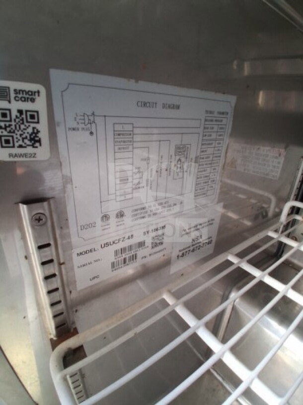 Alt text: Interior label of 2019 Quality Cargo Food Trailer showing circuit diagram and model number USLCFZ-48.