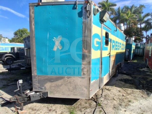 2018 Freedom 20' Food Trailer, dual-axle, with large service window, Henny Penny fryer, Ovention oven, refrigeration units.