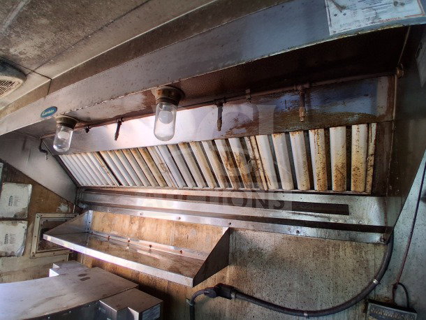 2018 Freedom 20' food trailer interior showing commercial exhaust hood with lights. VIN: 5WKBE2022J1053053.