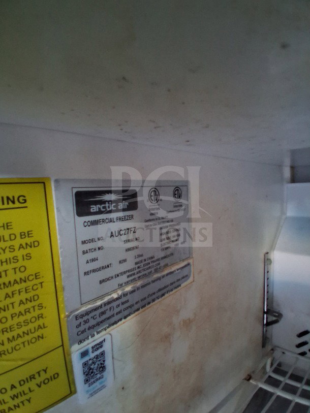 Label inside the Arctic Air commercial freezer model AUC27FZ used in the 2021 Haulmark mobile kitchen trailer.