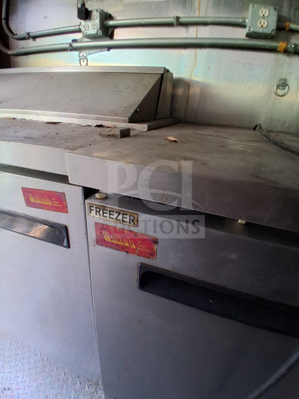 2021 Haulmark 8.5' x 24' Mobile Kitchen Trailer interior with Arctic Air refrigeration, labeled "Freezer."