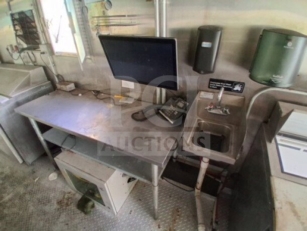 2021 Haulmark 8.5' x 24' Mobile Kitchen Trailer interior. Includes Arctic Air refrigeration, commercial sink, and exhaust hood.