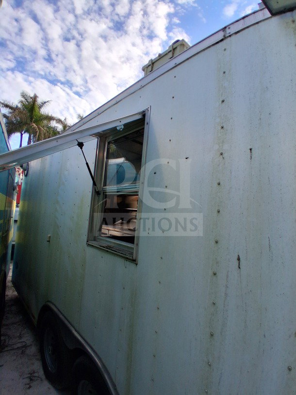 2021 Diamond Cargo 24' Custom Mobile Kitchen, weathered exterior, side window, professional-grade mobile kitchen.