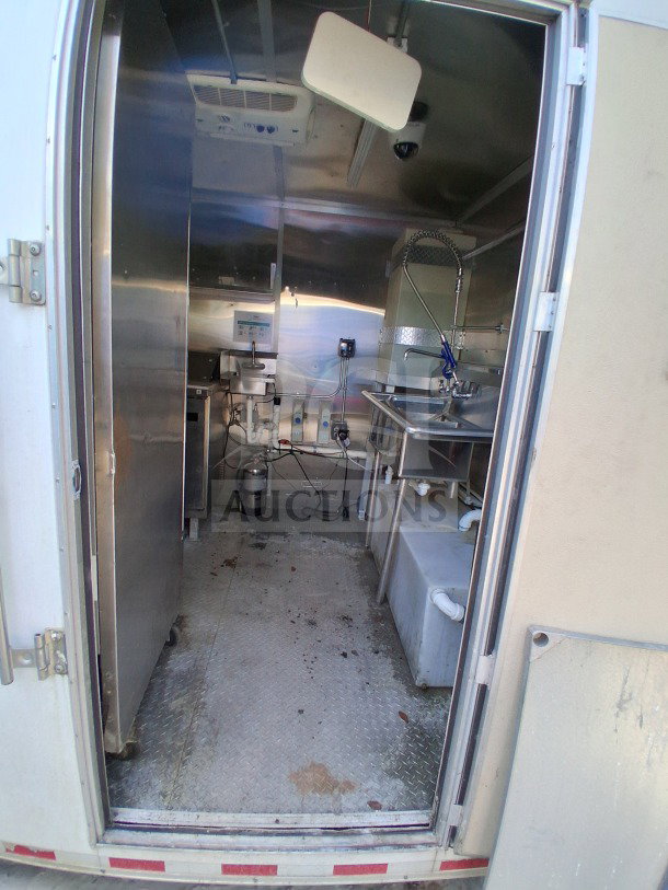 2021 Diamond Cargo 24' custom mobile kitchen, stainless interior, double Dean fryers, Arctic Air, fire suppression system.