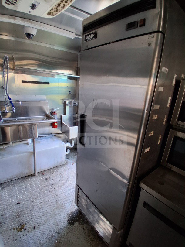 2021 Diamond Cargo 24' Custom Mobile Kitchen interior with stainless steel, Bison fridge, Arctic Air Package, and fire suppression system.