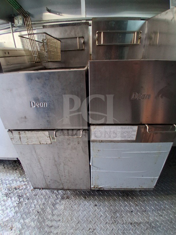 2021 Diamond Cargo 24' mobile kitchen featuring dual Dean deep fryers, stainless steel interior, used condition.
