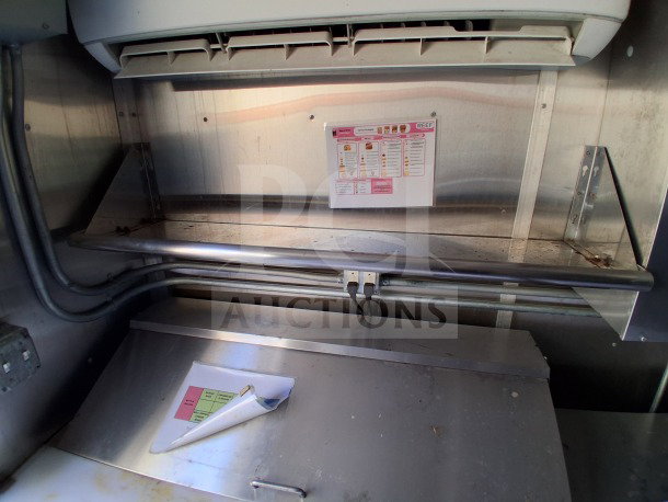 2021 Diamond Cargo 24' Custom Mobile Kitchen interior, featuring stainless steel setup, Arctic Air unit, and control panel.