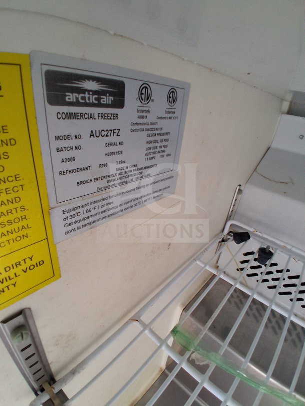 Arctic Air freezer label in a 2021 Diamond Cargo 24' Custom Mobile Kitchen, featuring model AUC27FZ and specs.