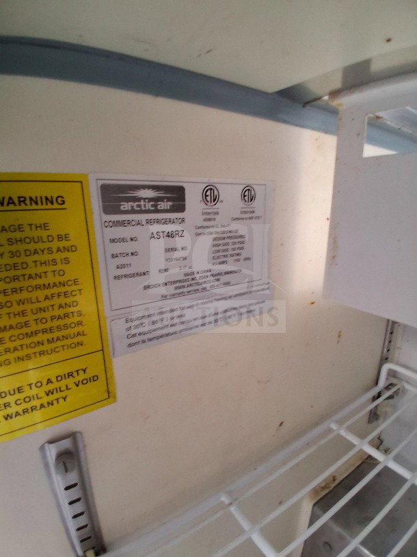 Label inside the Arctic Air AST48RZ refrigerator, indicating model and specifications for a mobile kitchen.