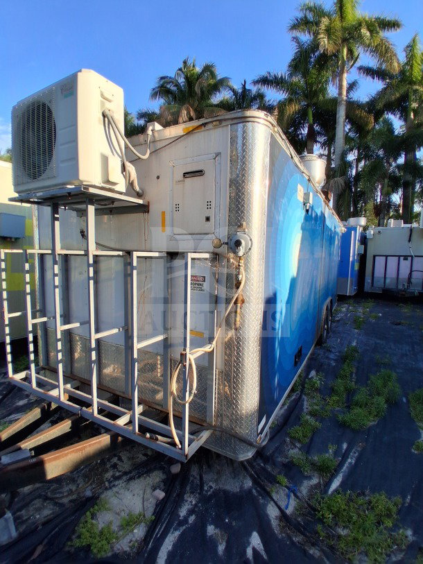 2019 Quality Cargo Food Trailer with grease hood, dual fryers, griddle, burner cooktop, Atosa refrigeration. LOT-110.
