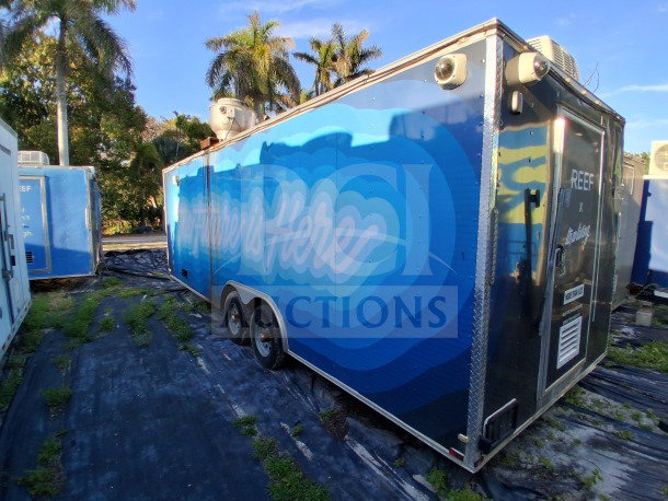 2019 Quality Cargo Food Trailer, blue exterior, equipped with grease hood, dual fryers, griddle, burner cooktop, Atosa fridge suite.