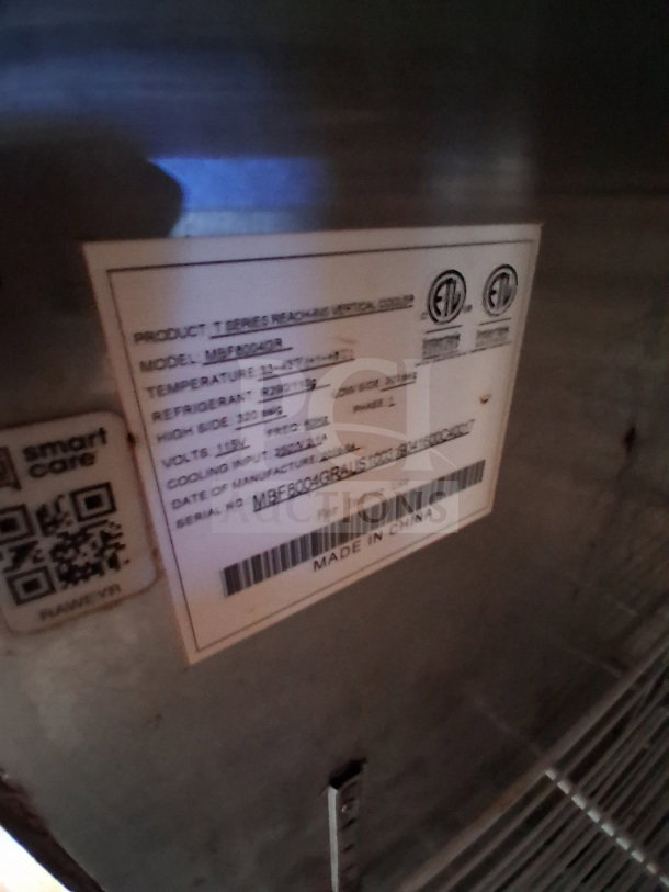 Label inside a 2019 Quality Cargo Food Trailer showing model number MGF800GR, temperature range, and made in China.