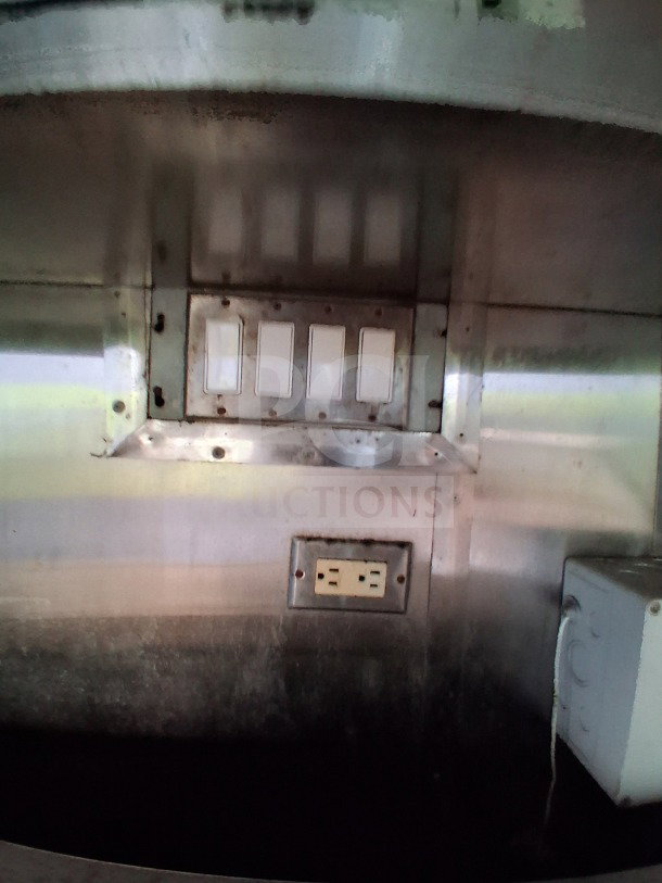2019 Quality Cargo Food Trailer, interior detail showing electrical outlets, stainless steel panel for commercial kitchen use.