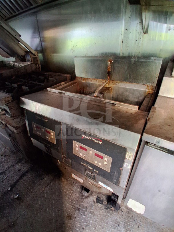 2019 Quality Cargo food trailer with commercial kitchen, dual fryers, burner cooktop, and Atosa refrigeration.