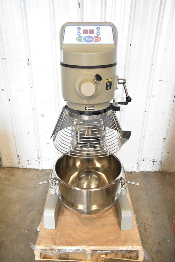 Brand new Globe SP40 40 Qt. planetary floor mixer with manual bowl lift, mixing bowl, bowl guard, dough hook, whisk.