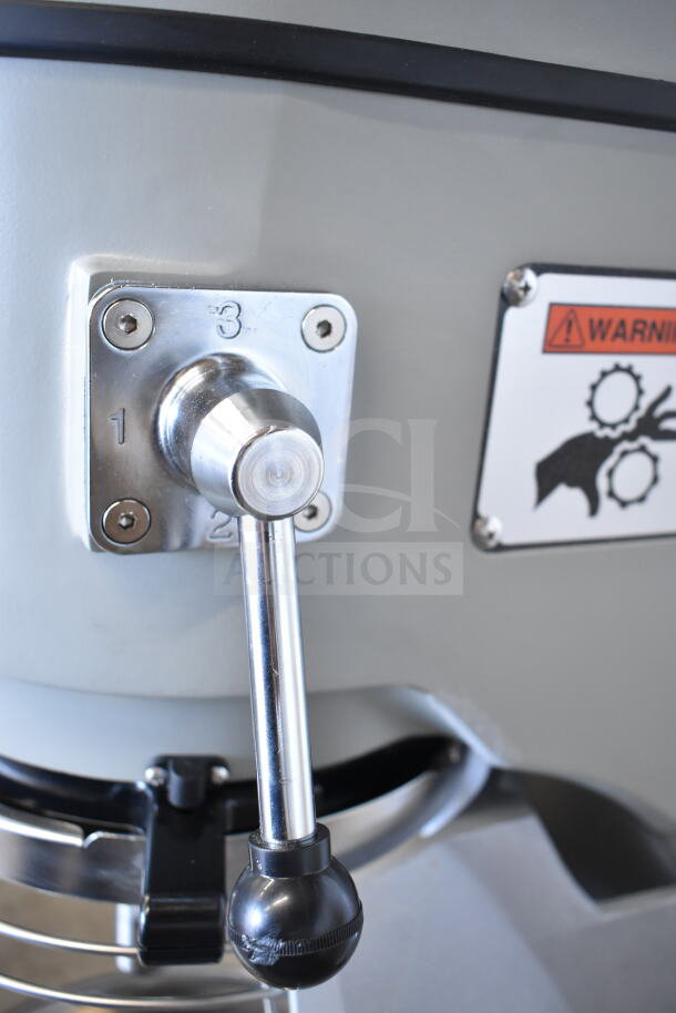 BRAND NEW 2025 Globe SP40 mixer manual control lever, with warning label visible; stainless steel construction.