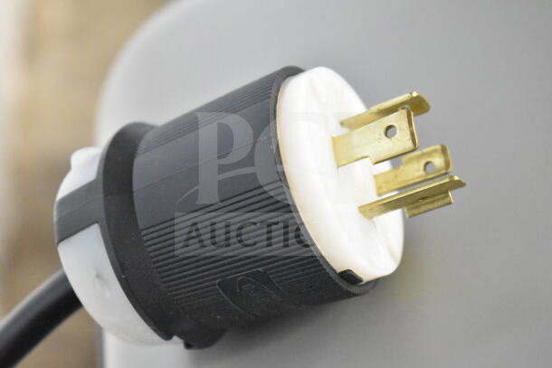 Close-up of a plug for the Globe SP40 Commercial 40 Qt. Mixer, 208 Volts, 3 Phase. Black and white casing.