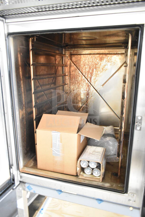 2024 Blodgett Invoq Hybrid Combi Oven with ventless Hoodini, model 10-2/1GN, scratch and dent condition. 208V, 3 Phase.