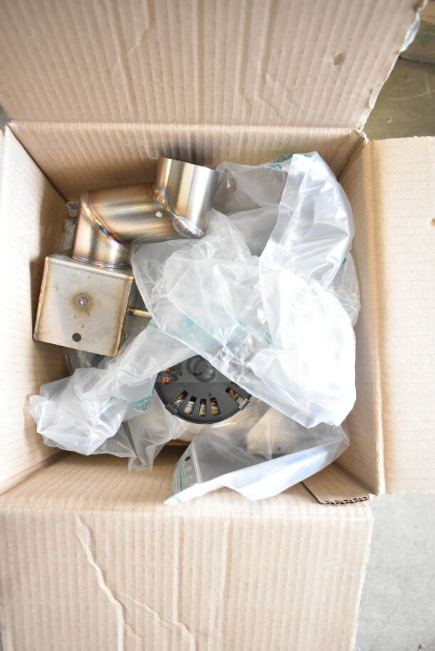 Cardboard box containing parts for a Blodgett Hoodini 10-2/1GN, shown with protective packaging.